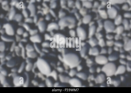 Icelandic Beach Pebbles Background. Horizontal defocused blur shot Stock Photo