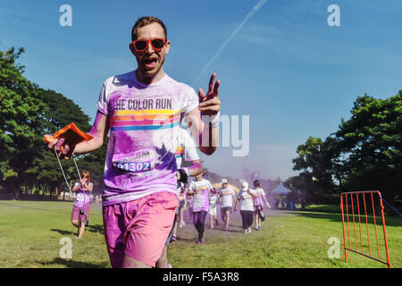 Bangkok, Thailand. 31st Oct, 2015. A man participates in the Color Run Bangkok at the Suan Rod Fai park in Bangkok, Thailand, on Oct. 31, 2015. The Color Run is a 5km public paint race that originated in the U.S. in 2011. In a typical Color Run race, participants will end up covered in a mixture of colored powders made from corn starch. Credit:  Li Mangmang/Xinhua/Alamy Live News Stock Photo