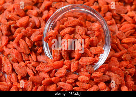 Dried wolf berries with glass bowl Stock Photo