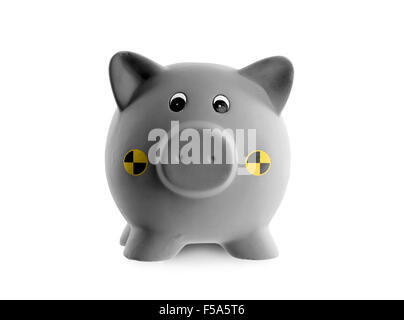 Ceramic piggy bank (crash test dummy) isolated on white Stock Photo