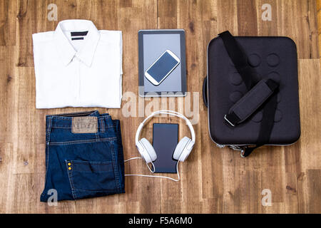 Informal male outfit with electronics, background Stock Photo