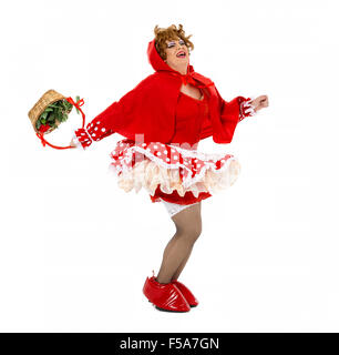 Actor Drag Queen Dressed as Little Red Riding Hood, on white background Stock Photo
