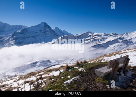 first mountain and the snow peaks of Jungfrau region grindelwald switzerland Stock Photo