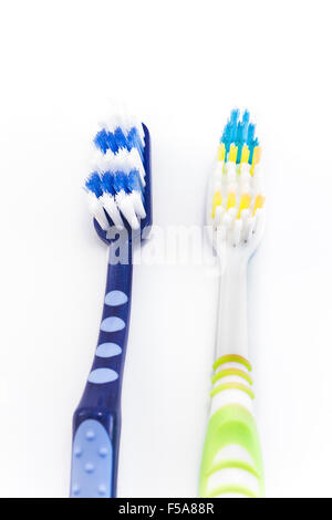 Two toothbrushes isolated on white. Stock Photo