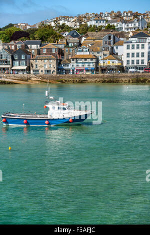 Fishing boat in the fishing harbour of St Ives, seen from Smeatons Pier, Cornwall, England, UK Stock Photo