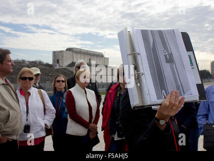 Guide shows maintenance photo of Zeppelin Field stadium podium, where Hitler held his largest propaganda rallys in the 1930s. Stock Photo