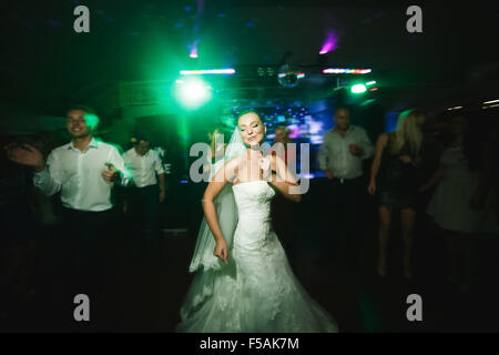 beautiful bride and groom dancing Stock Photo