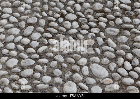 Floor walkway made of small pebbles Stock Photo