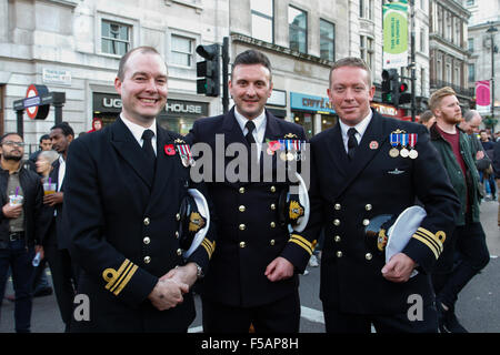 London, UK. 31st October 2015. Flag Officers Sea Training North enjoying the Rugby World Cup final match between New Zealand and Australia match shown on the big screen at the Trafalgar Square Fanzone. Credit: Elsie Kibue / Alamy Live News Stock Photo