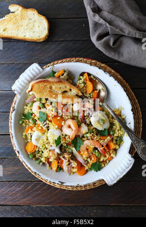 bulgur with roasted shimps, food top view Stock Photo