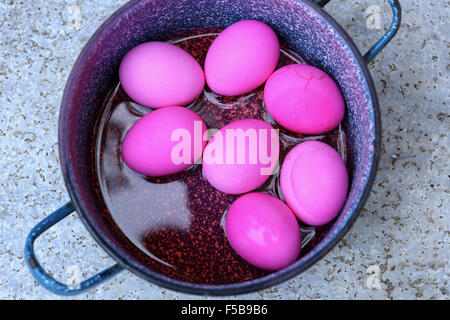 red hard boiled eggs (dyed with beetroot) a good start for Easter eggs (dyed with beetroot) This image has a restriction for lic Stock Photo