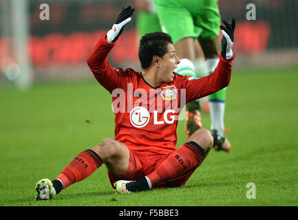 Leverkusen's Javier Hernandez sits on the ground during the German Bundesliga soccer match between VfL Wolfsburg and Bayer 04 Leverkusen in the Volkswagen Arena in Wolfsburg, Germany, 31 October 2015. Photo: PETER STEFFEN/dpa Stock Photo