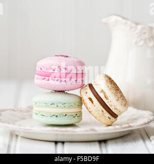 Pastel macarons on a plate Stock Photo