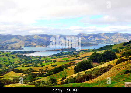 Akaroa-a small town on Banks Peninsula in the Canterbury region of the South Island of New Zealand, situated within a harbour. Stock Photo