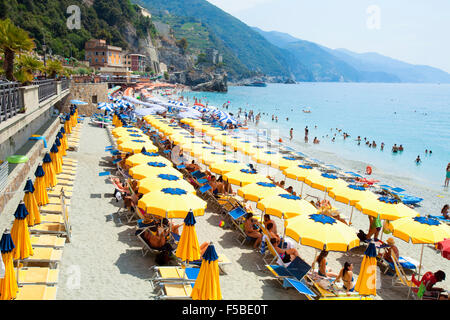 Italy Cinque Terre Monterosso - Sunbathers on the Beach Stock Photo