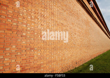 Brick wall in perspective, receding into the distance Stock Photo