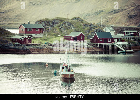 Typical Norwegian fishing village with traditional red rorbu huts,Honningsvåg Stock Photo