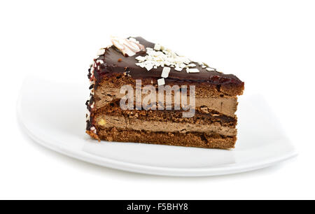 Chocolate cake slice on white dish isolated Stock Photo