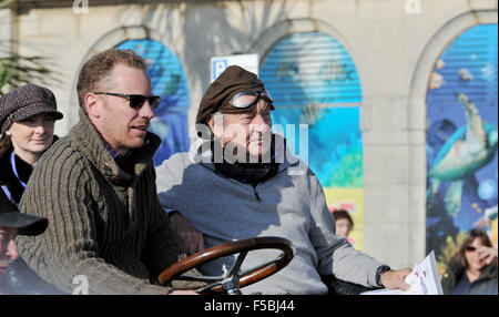 Brighton, Sussex, UK. 1st November, 2015. Pink Floyd drummer Nick Mason in the passenger seat of his Panhard Levassor arrives at the finish line in Madeira Drive after completing the Bonhams London to Brighton Veteran Car Run  Credit:  Simon Dack/Alamy Live News Stock Photo