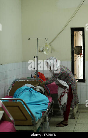Dhaka, Bangladesh. 1st Nov, 2015. DHAKA, BANGLADESH 01st November : Injured publisher Ahmed Rahim Tutul Barman receives treatment at the Dhaka Medical College Hospital in Dhaka on November 01, 2015.Deepan was hacked to death and three other people wounded in fresh attacks in Bangladesh's capital that were claimed by Muslim radicals, and a human rights group called on the government to urgently protect freedom of expression. © Zakir Hossain Chowdhury/ZUMA Wire/Alamy Live News Stock Photo