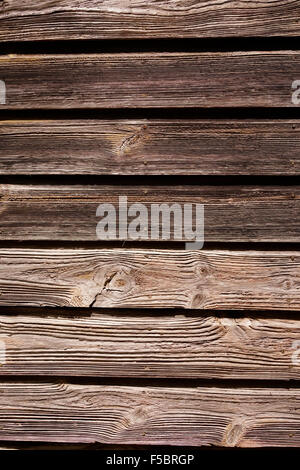 Abstract weathered wood on building in Key West FL USA Could be used as background, good copy space Some with louvered windows. Stock Photo