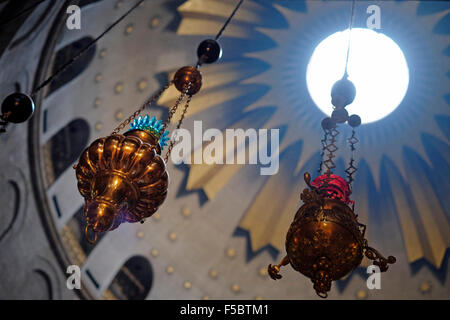 Lamps decorating the Dome of the Rotunda of the Church of the Holy Sepulchre in the Old city East Jerusalem Israel Stock Photo