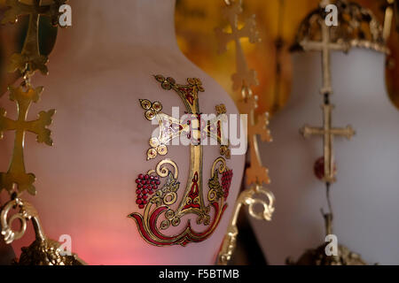 Lamps over the Stone of the Anointing or Stone of Unction inside the church of Holy Sepulchre in the Christian Quarter old city East Jerusalem Israel Stock Photo