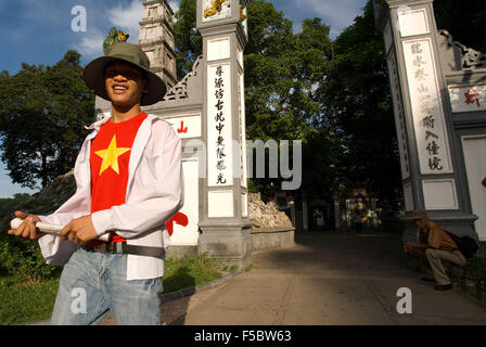 Entrance of The Huc bridge leading to Ngoc Son Temple (Jade Mountain) in Hoan Kiem. Hanoi Old Quarter. Huc Bridge to Ngoc Son Te Stock Photo