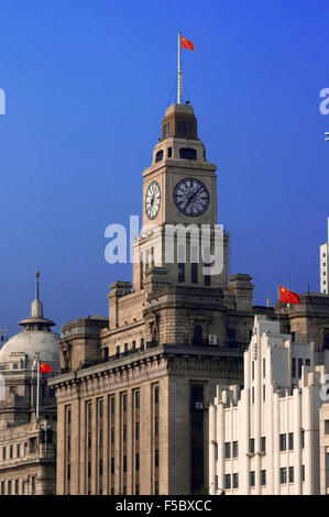 The Bund lit up at night with Customs House and HSBC buildings Bund Shanghai. Bell Tower of the Shanghai Customs House, The Bund Stock Photo