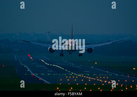 Air India Boeing 787 Dreamliner landing at dusk, Birmingham Airport. UK Stock Photo