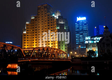 Garden bridge shanghai. Suzhou Creek, Waibaidu (Garden) Bridge, illuminated at night, Shanghai, China. The Waibaidu Bridge, Wàib Stock Photo