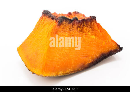 Baked pumpkin isolated on white. Stock Photo