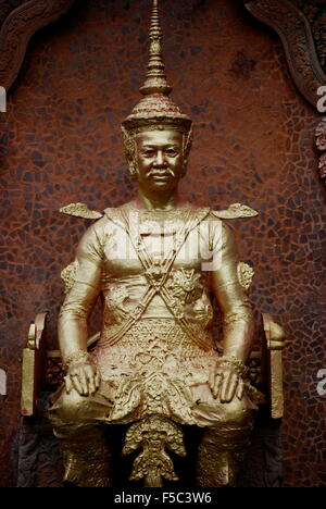 Gold statue of a king in Phnom Penh Cambodia Stock Photo