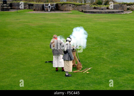 A demonstration of old weaponry at Pendennis Castle. Falmouth, Cornwall, England Stock Photo