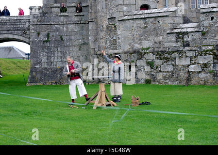 A demonstration of old weaponry at Pendennis Castle. Falmouth, Cornwall, England Stock Photo