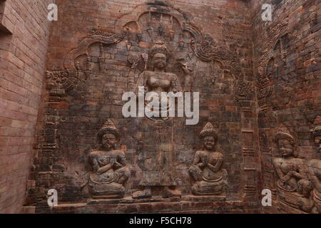 Carving in bricks Stock Photo