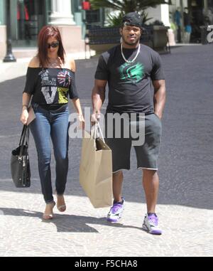 Baseball player Yasiel Puig and girlfriend, Andrea de la Torre shopping in Beverly Hills  Featuring: Yasiel Puig, Andrea de la Torre Where: Los Angeles, California, United States When: 31 Aug 2015 C Stock Photo