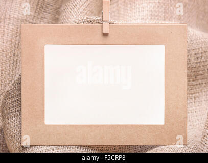 Frame on sackcloth. Stock Photo