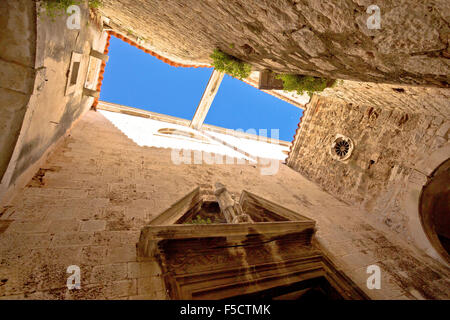 Old stone narrow street in Sibenik, Dalmatia, Croatia Stock Photo