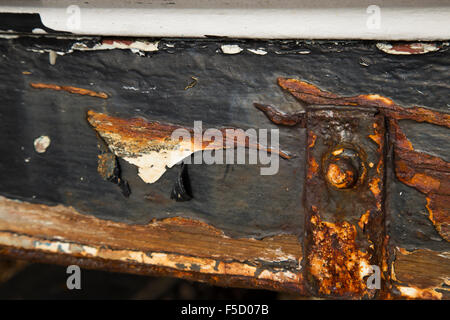 Rusted metal work on a boat hull Stock Photo