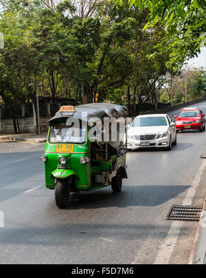 Tuk-tuk in traffic, Bangkok, Thailand Stock Photo