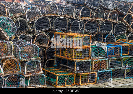 Lobster pots lined up on the quayside at Whitby, Stock Photo