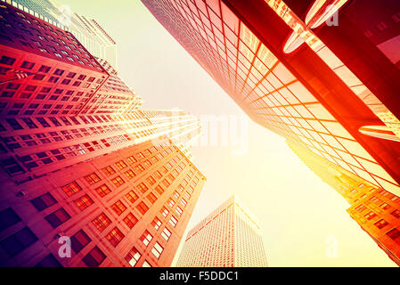 Vintage style skyscrapers in Manhattan at sunset, NYC, USA. Stock Photo