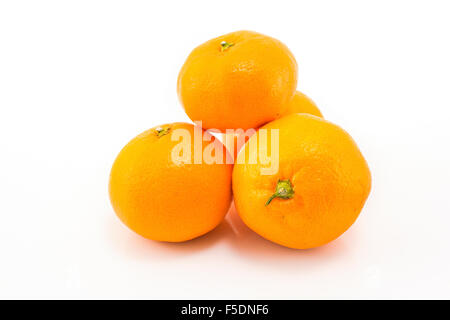Fresh tangerines isolated on white. Stock Photo