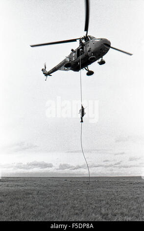 HMS Endurance Royal Marine detachment with a Westland Whirlwind helicopter in the Falklands1973 Stock Photo