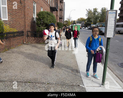 Children going home after school in Kensington, Brooklyn, NY, 2015. Stock Photo