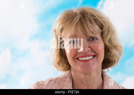 Portrait of smiling businesswoman standing in office Stock Photo