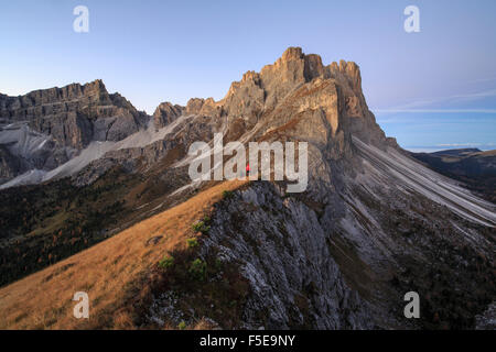 Hiker admires the rocky peaks Furcella De Furcia, Odle, Funes Valley, South Tyrol, Dolomites, Trentino-Alto Adige, Italy, Europe Stock Photo