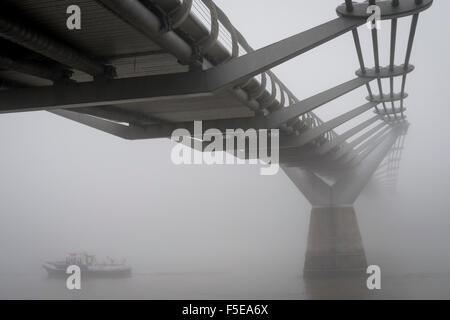 Thick Fog over The Millennium Bridge and River Thames this morning. Stock Photo