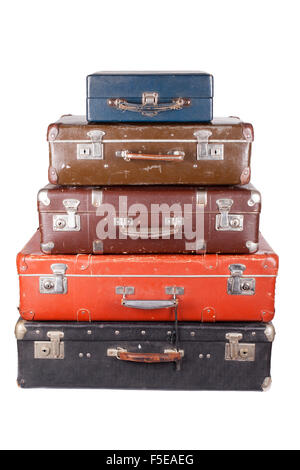 A stack of old suitcases isolated on a white background Stock Photo